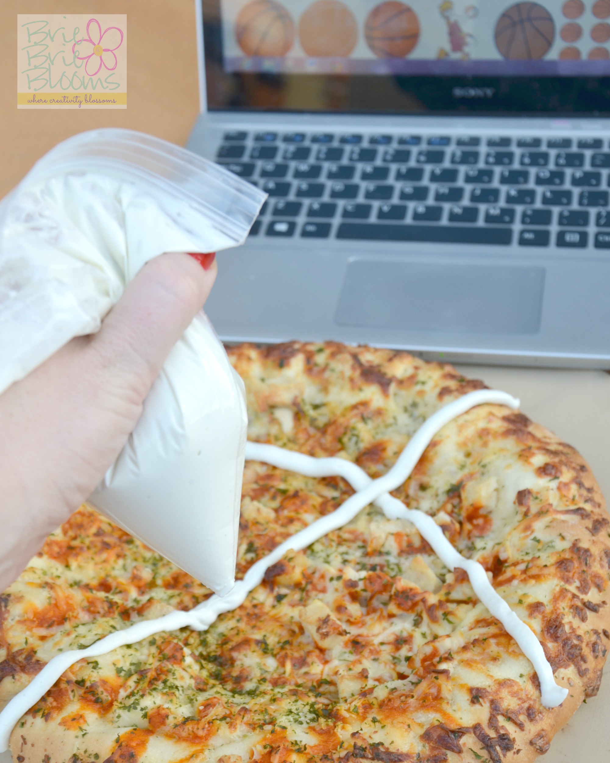 decorate-basketball-pizza-with-blue-cheese-sauce