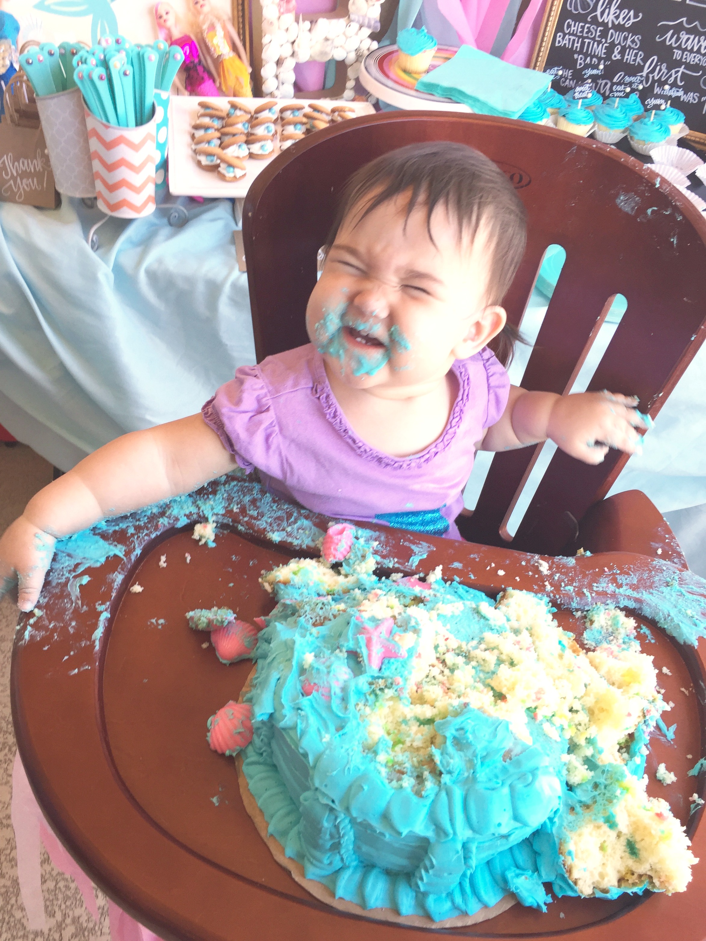 See how we celebrated my daughter's birthday with a First Birthday Mermaid Party. The whimsical pink and turquoise theme was further embellished by pearls.