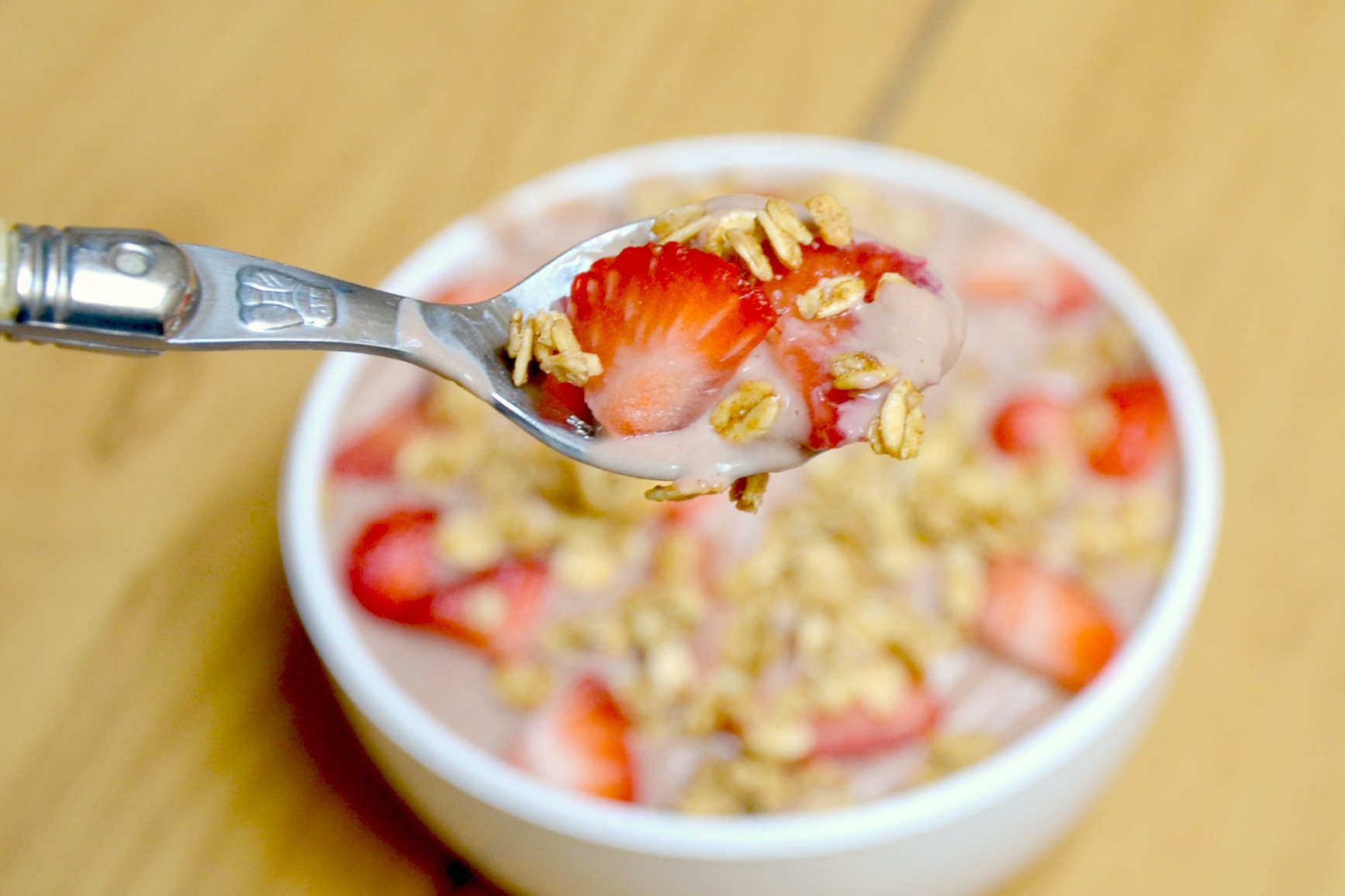 bite of chocolate strawberry breakfast energy bowl