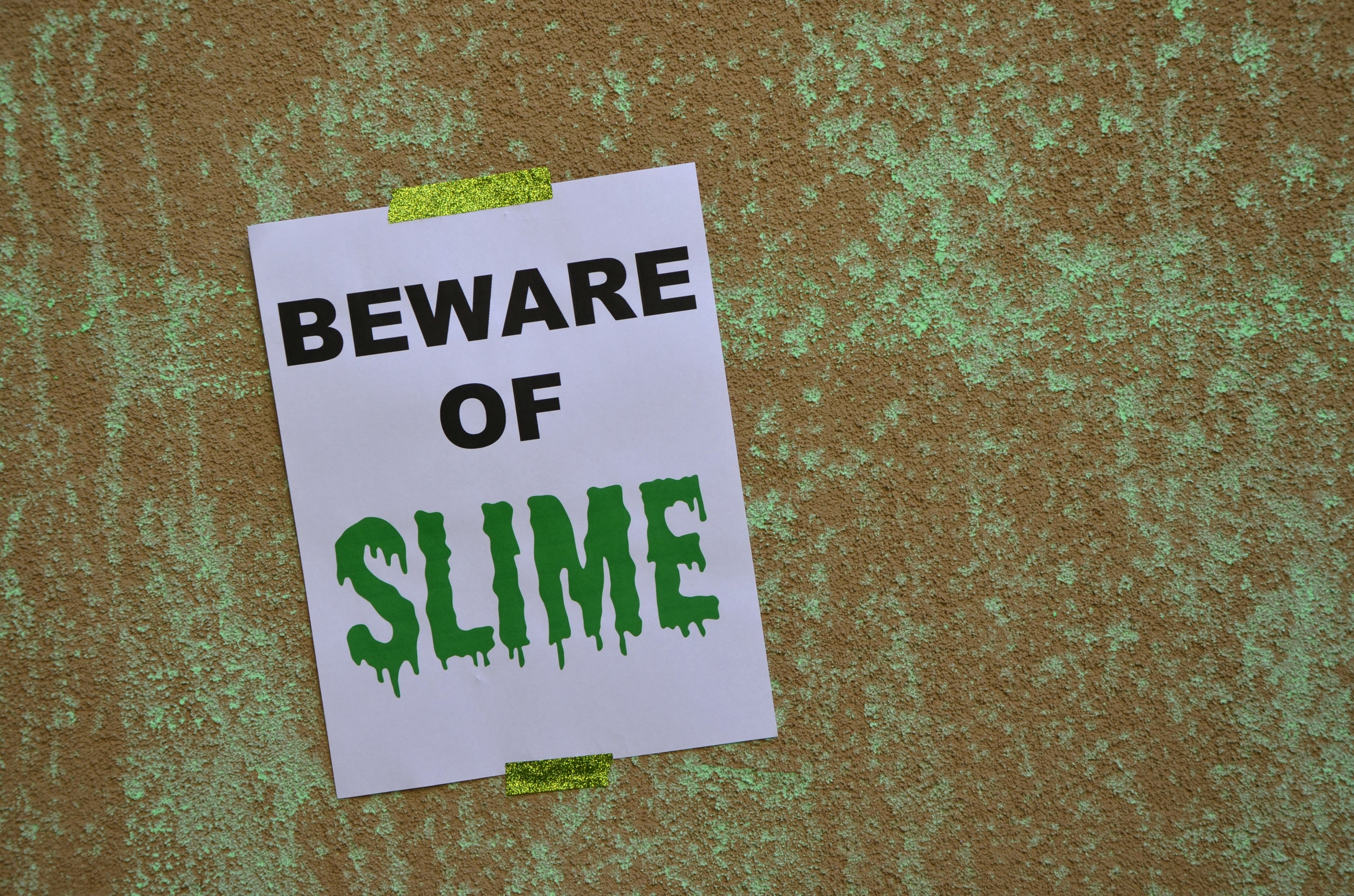 Slimer Party hung Beware of Slime print