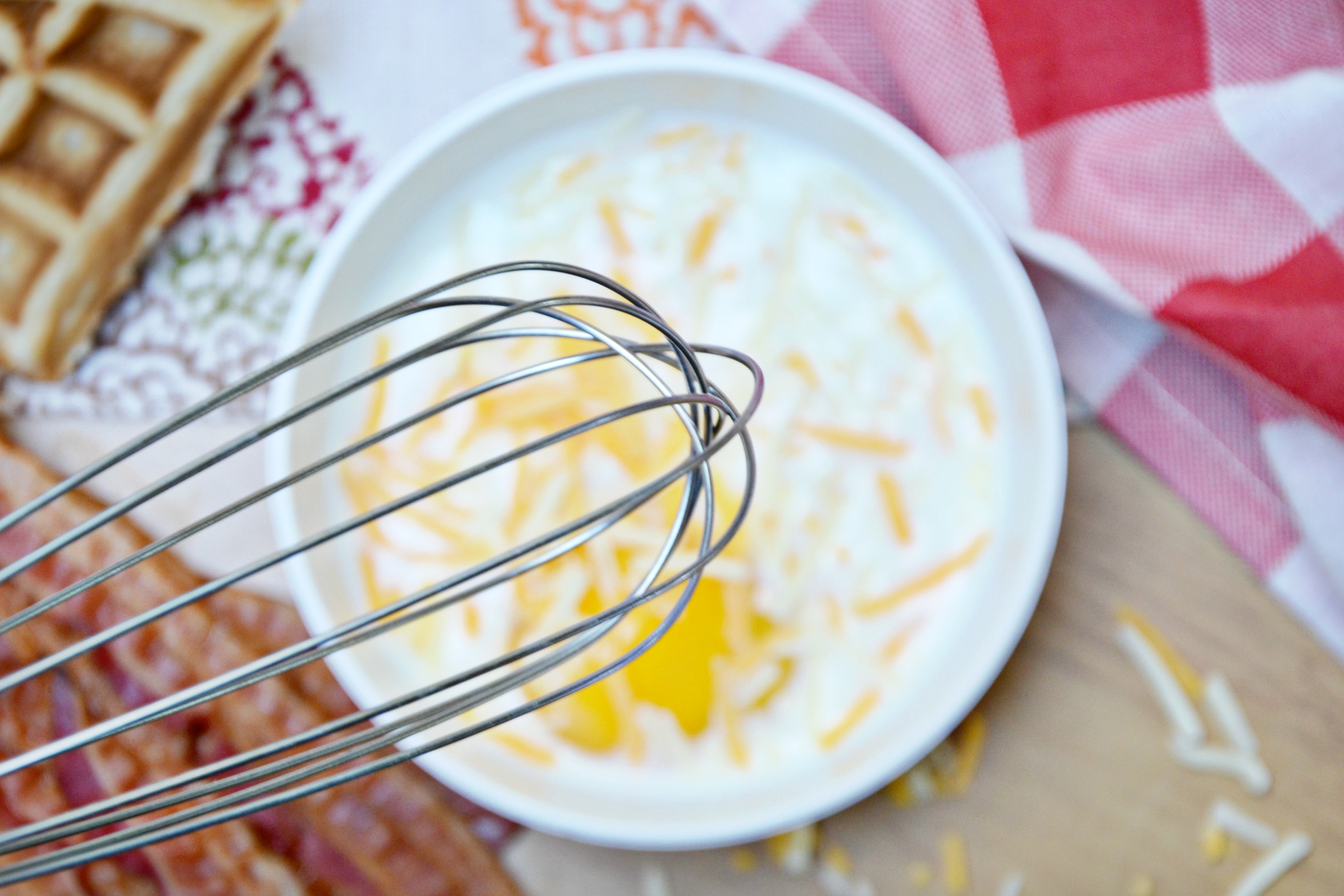 waffle breakfast sandwich whisk egg