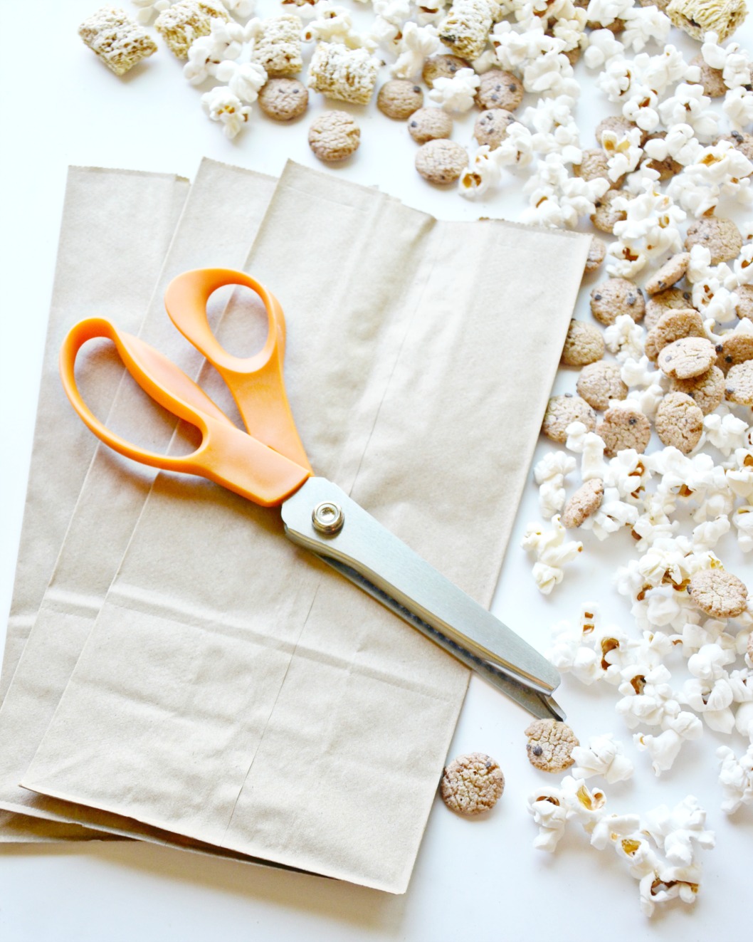 This cereal popcorn snack mix recipe is yummy with Chocolatey Chip Cookie Bites or your favorite cereal mix in for family movie nights!