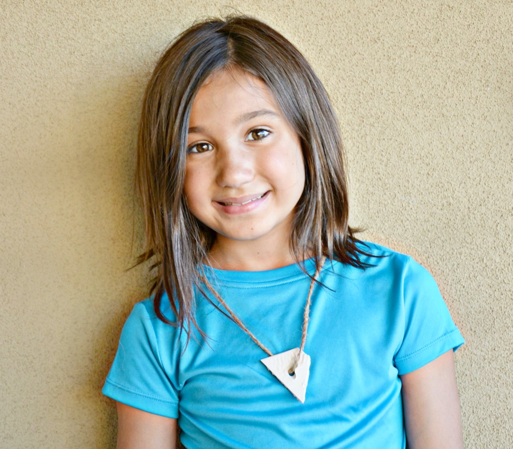 Make this fun and easy shark tooth necklace craft to celebrate Shark Week and celebrate your love for sharks all year long!
