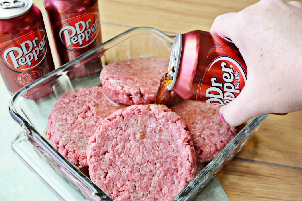 Get ready for football season with this deliciously easy grilling recipe for burgers marinated in Dr Pepper® then served smothered with Ranch dressing.