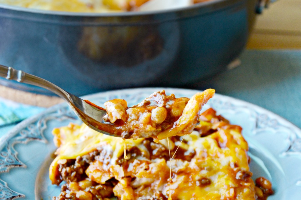 Make this easy one pan skillet enchilada casserole with white chili beans and ground beef on your busiest evenings for a great family meal. 