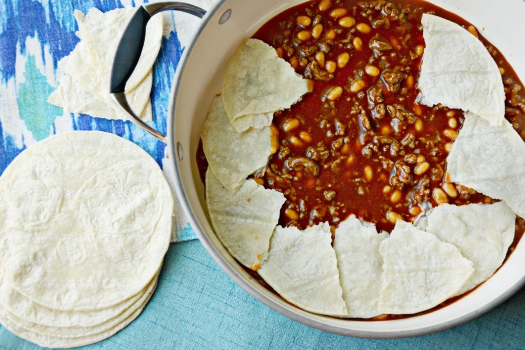 One Pan Skillet Enchilada Casserole with White Chili Beans and Ground