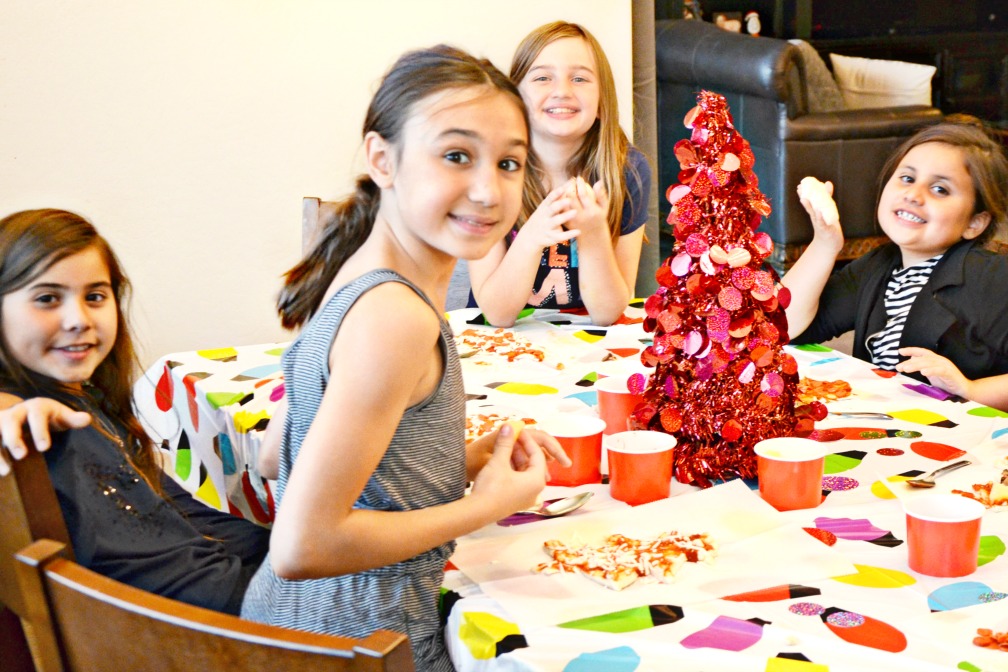 Host an easy holiday crafting party with Oonies holiday crafts. Use recycled wrapping supplies for fun kids ornament ideas.
