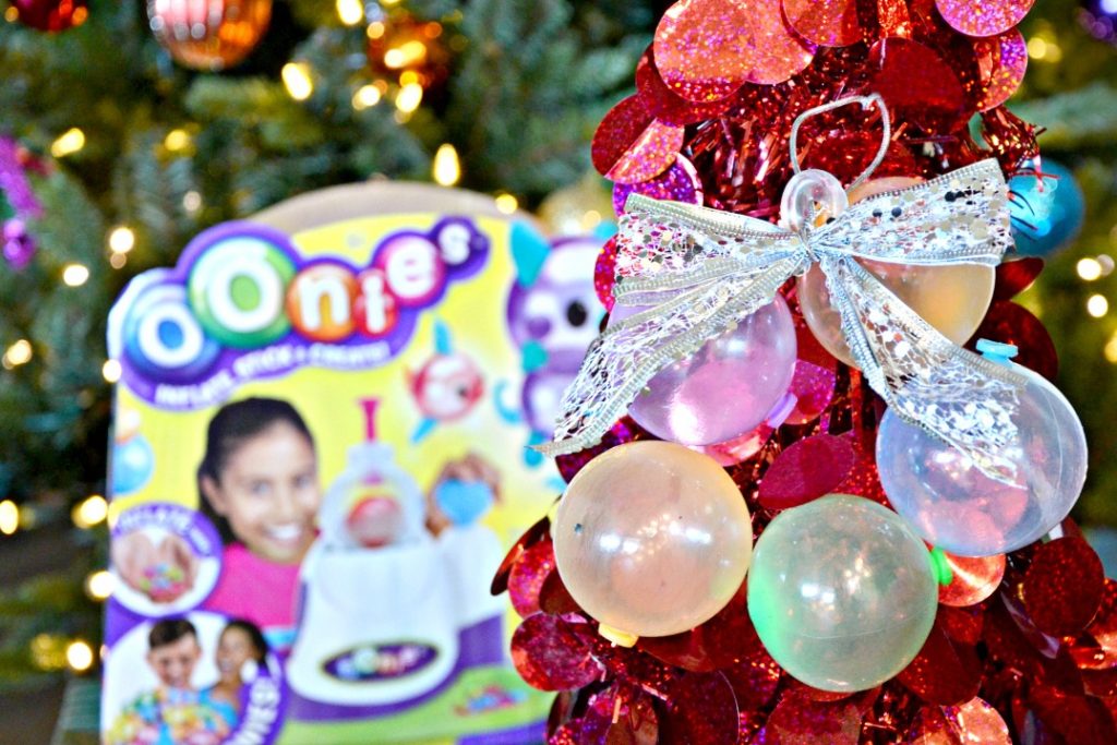 Host an easy holiday crafting party with Oonies holiday crafts. Use recycled wrapping supplies for fun kids ornament ideas.