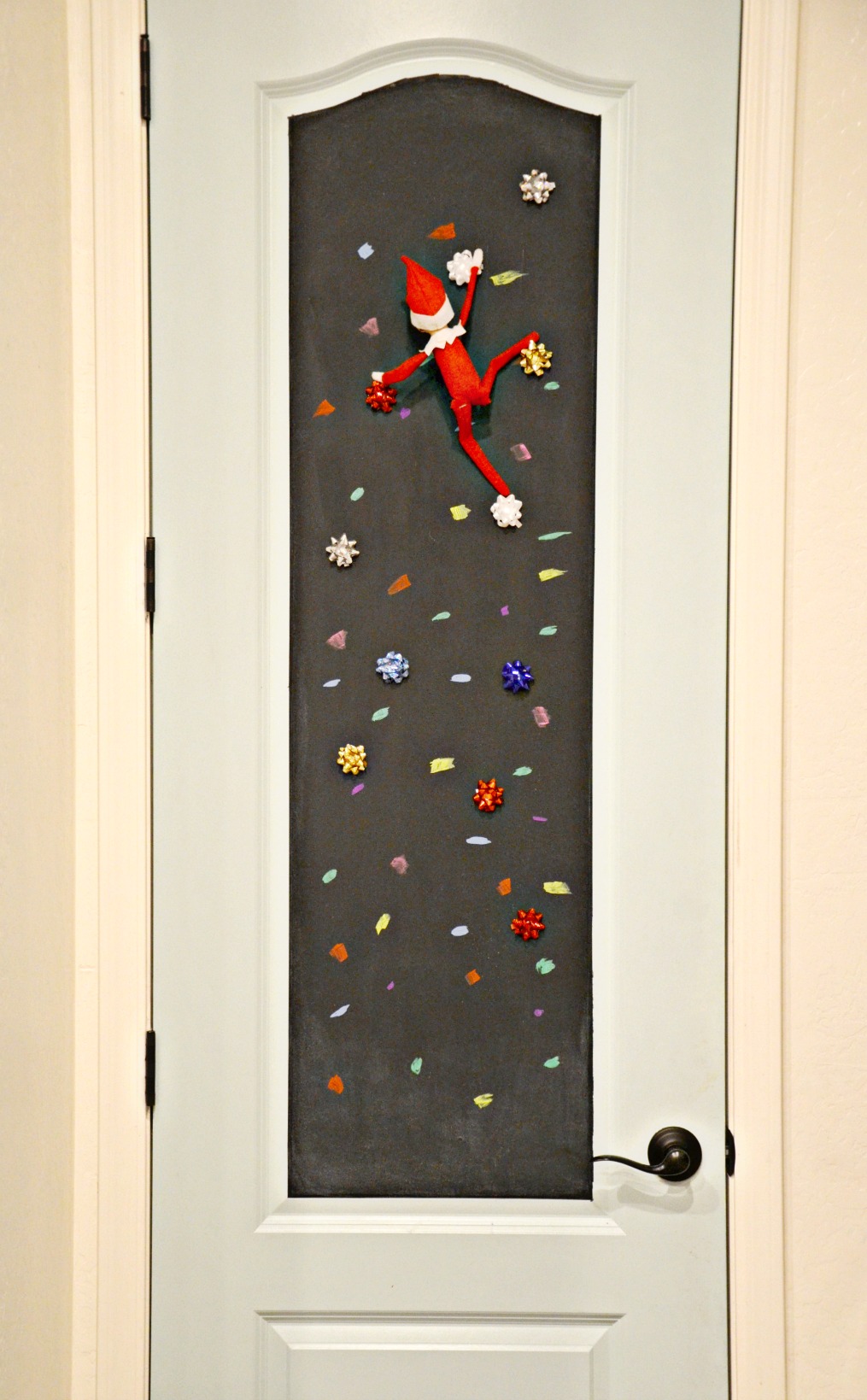 The rock climbing elf is an easy elf on the shelf idea to surprise your children and allow the elf to show off his or her rock climbing skills!