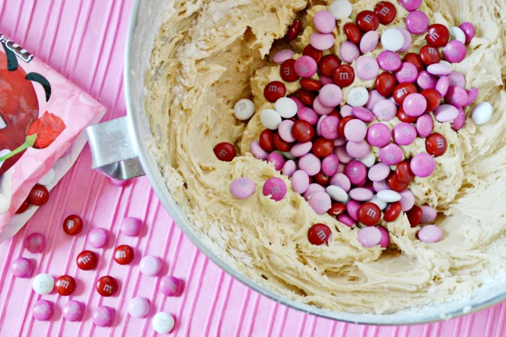 The Valentine's Cookie Dough Dip recipe does not have raw ingredients so you can dip away with heart shaped sugar cookies in celebration of love day!