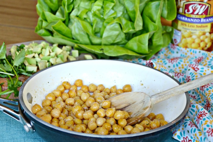 Cook garbanzo beans to make them soft and perfect for garbanzo beans lettuce wraps.