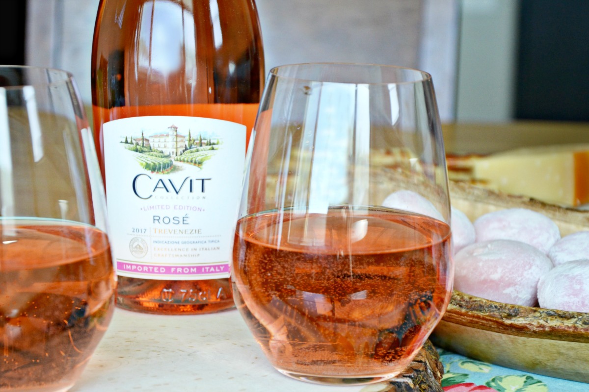 Rosé is the best wine to serve for a summer girls night in because it's pretty and has a great refreshing taste that pairs well with a light meal or appetizers. 
