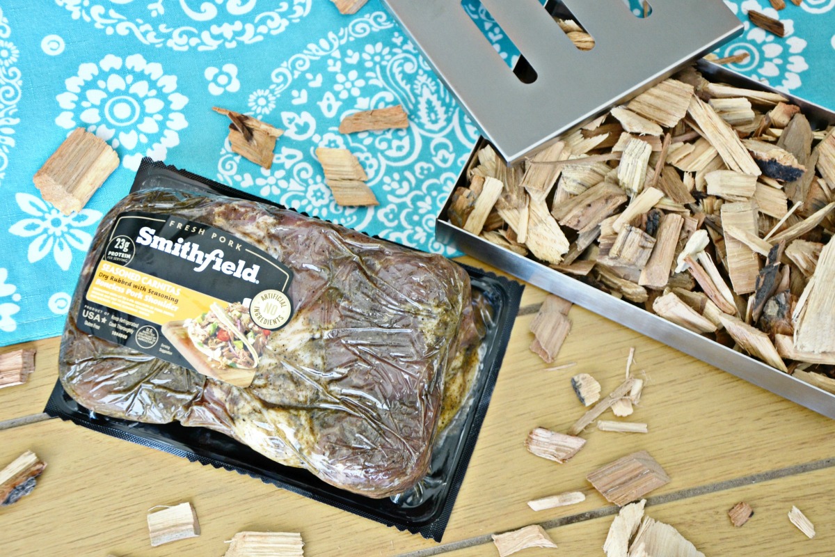 Smithfield® pork, a smoker box and wood chips is all you need to make pulled pork on a gas grill.