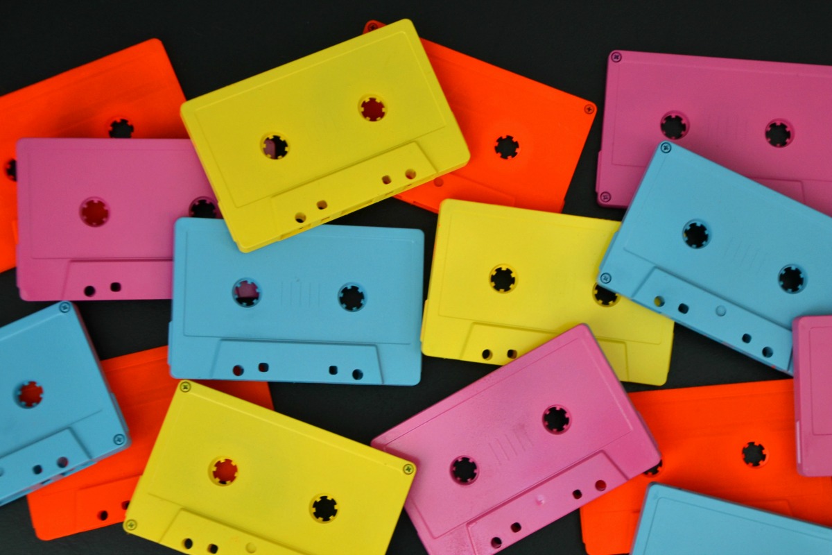 Spray paint blank cassette tapes with neon spray paint for a fun throwback party.
