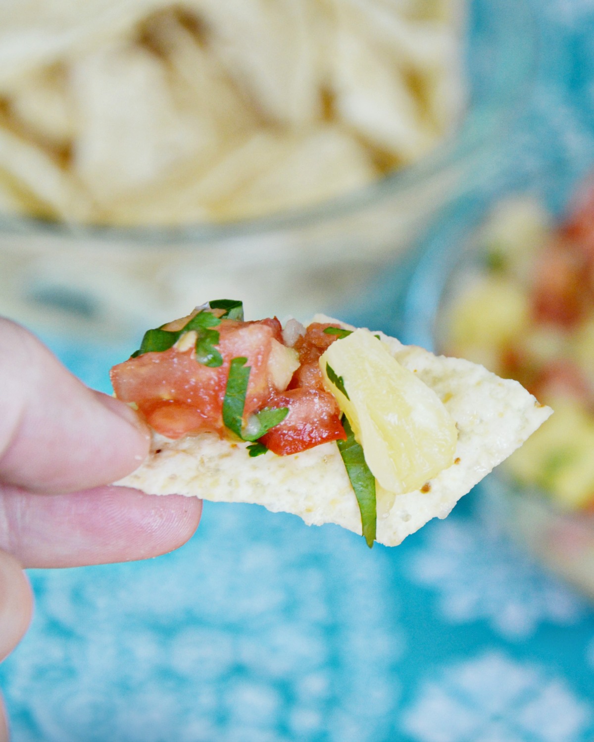This pineapple salsa is so easy to make and delicious on chips and veggies.