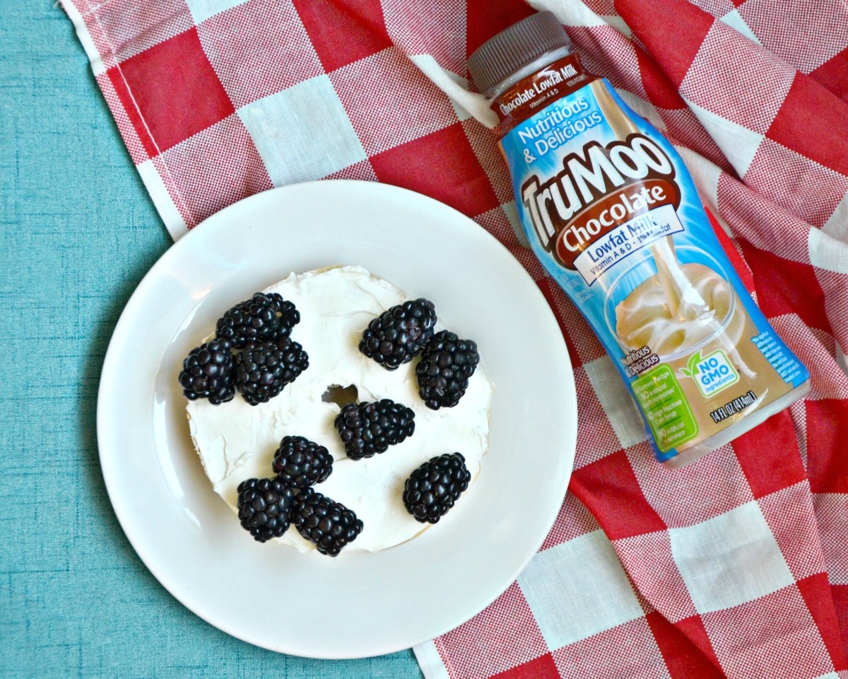 A cow bagel paired with chocolate milk is a great easy kids snack idea for summer!