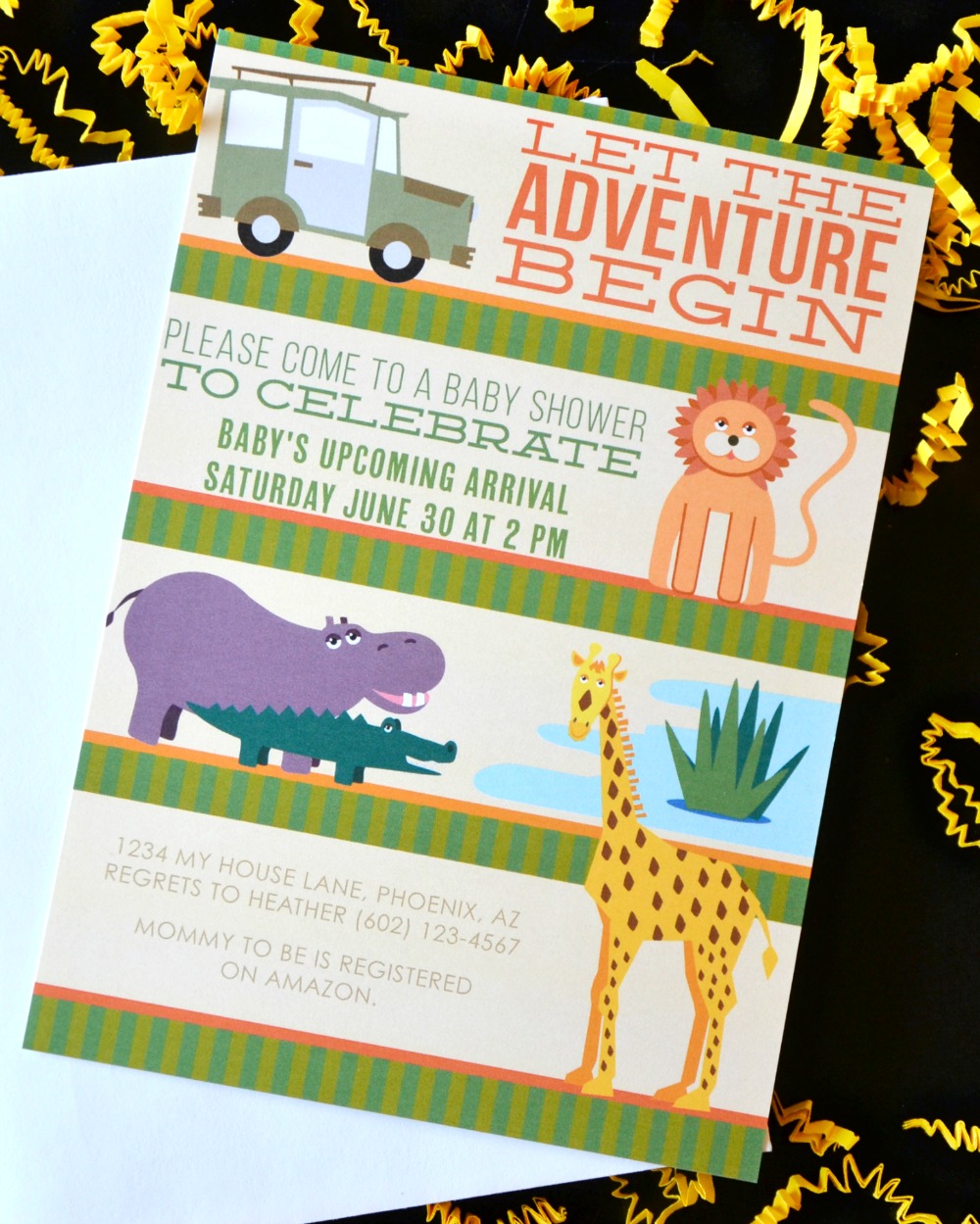 Plan an animal themed baby shower with these cute safari invitations.