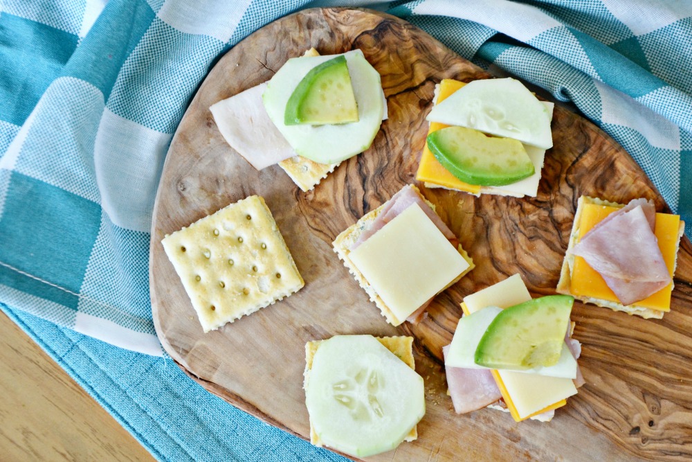 These Cream Cheese and Chive Deli Cracker Sandwiches can be made with a variety of deli meats, cheese and veggies.